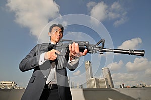 Asian Chinese Assasin preparing for action photo