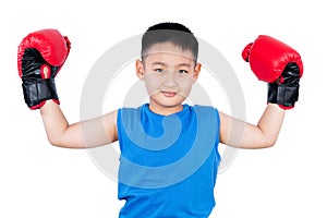 Asian Chinese boy wearing boxing gloves with victory