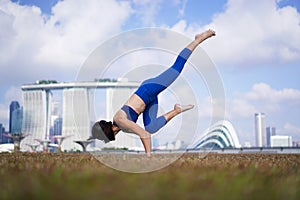 Asian Chinese Female Yogi outdoor yoga exercise under the sun