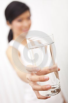 Asian Chinese Girl Holding Glass of Pure Water