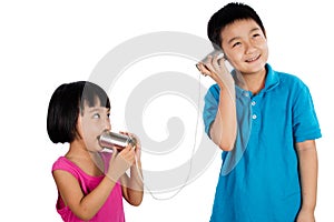 Asian Chinese Kid Playing with Tin Can Phone