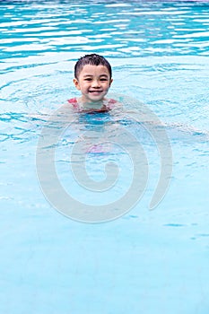 Asian Chinese Little Boy Swimming In The Pool