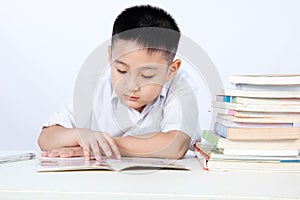 Asian Chinese Little Boy Wearing Student Uniform Reading Textbook