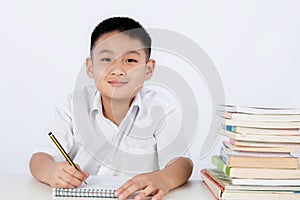 Asian Chinese Little Boy Wearing Student Uniform Writting Homework