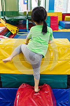 Asian Chinese little girl playing indoor