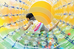 Asian Chinese Little Girl Playing Roller Wheel