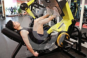 Asian chinese man in gym Ã¯Â¼ÅFitness sport man Training of leg strength in the gym