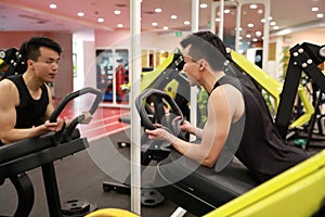 Asian chinese man in gym ï¼ŒFitness sport man Training strength in the gym