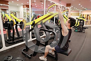 Asian chinese man in gym ï¼ŒFitness sport man Training strength in the gym