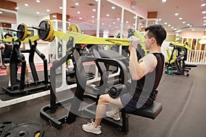 Asian chinese man in gym ï¼ŒFitness sport man Training strength in the gym