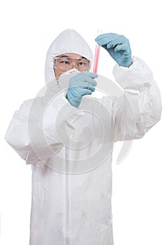 Asian Chinese scientist in protective wear holding test tube