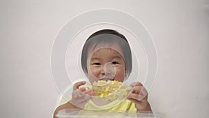 Asian Chinese Toddler dinner time with many expressions