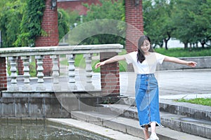 Asian Chinese university student enjoy free time at campus