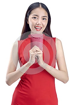 Asian Chinese woman in a cheongsam dress holding red envelopes Angpao