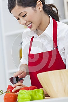 Asian Chinese Woman Preparing Vegetables Salad Food in Kitchen