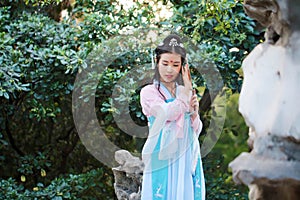 Asian Chinese woman in traditional ancient drama costume hanfu cosplay