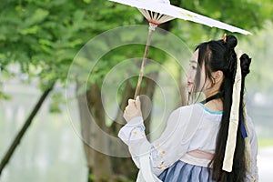 Asian Chinese woman in traditional Hanfu dressï¼Œclassic beauty in Chin