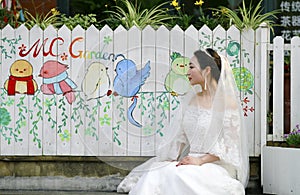 Asian Chinese woman in wedding dress