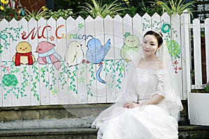 Asian Chinese woman in wedding dress