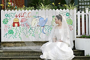 Asian Chinese woman in wedding dress