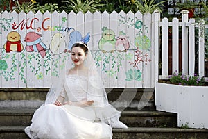 Asian Chinese woman in wedding dress