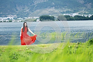 Asian Chinese Young girl walk by beach, enjoy peaceful life