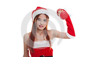 Asian Christmas girl with Santa Claus clothes and red dumbbell.