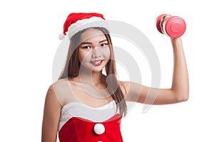 Asian Christmas girl with Santa Claus clothes and red dumbbell.