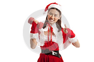 Asian Christmas Santa Claus girl thumbs up with red dumbbell.