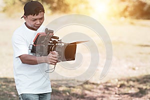 Asian cinematographers operate camera cinematic shoot and content creator use camera cinematic