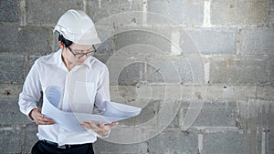 Asian civil engineer man working at construction site