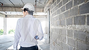 Asian civil engineer man working at construction site