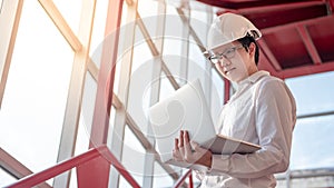 Asian civil engineer man working at construction site