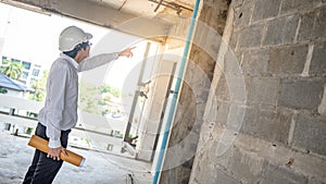 Asian civil engineer man working at construction site