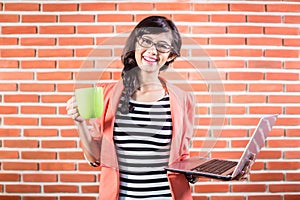 Asian college student with Laptop and coffee