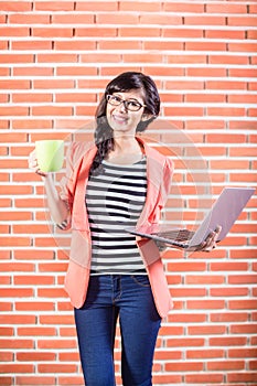 Asian college student with Laptop and coffee