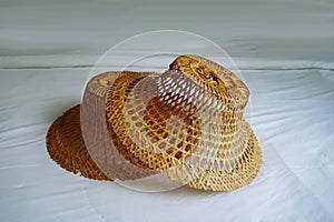 Asian conical hats. Bamboo woven hat. Woven wooden hat craft wood background asain culture traditional handmade old