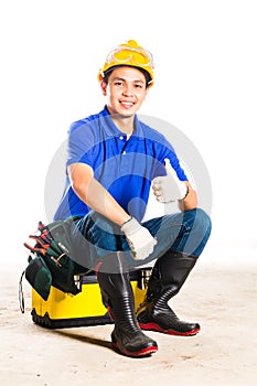 Asian construction worker with tools