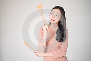Asian cooking woman preparing food in kitchen studio isolated on