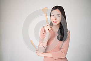 Asian cooking woman preparing food in kitchen studio isolated on