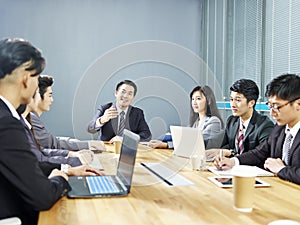 Asian corporate business people meeting in office