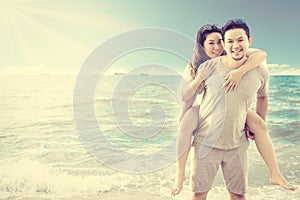 Asian couple on beach