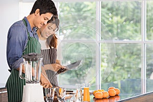 Asian couple at kitchen room