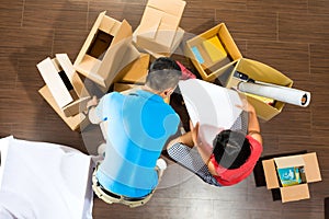 Asian couple moving in the new home