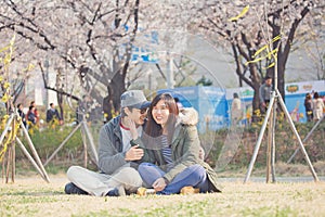 Asian couple in park