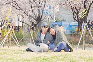 Asian couple in park