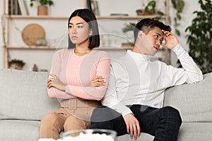 Asian Couple After Quarrel Not Talking Sitting Offended At Home