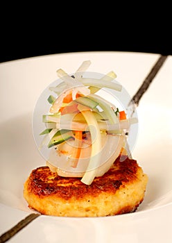 Asian crab cake with scallop and vegetable salad