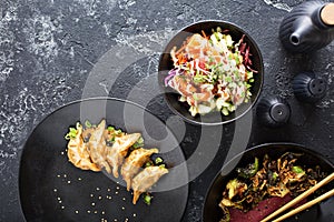 Asian cuisine dishes on the table overhead view