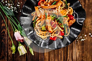 Asian cuisine vegetables udon noodles wok